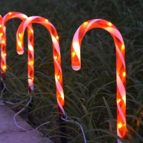 Christmas lighting in the form of a candy cane with a solar battery