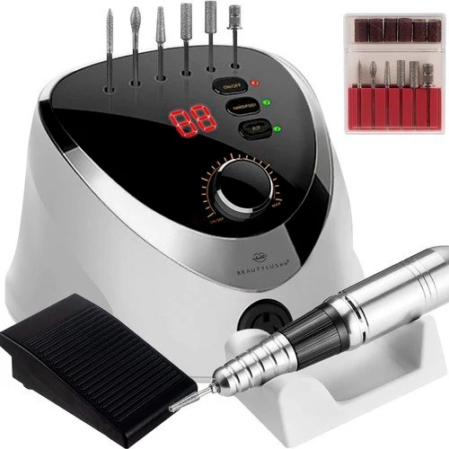 Manicure and pedicure machine with cutters, foot pedal